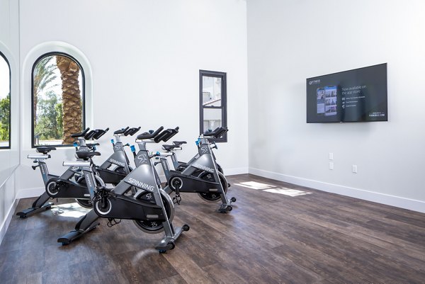Yoga and spin studio with modern equipment at Sorano Apartments