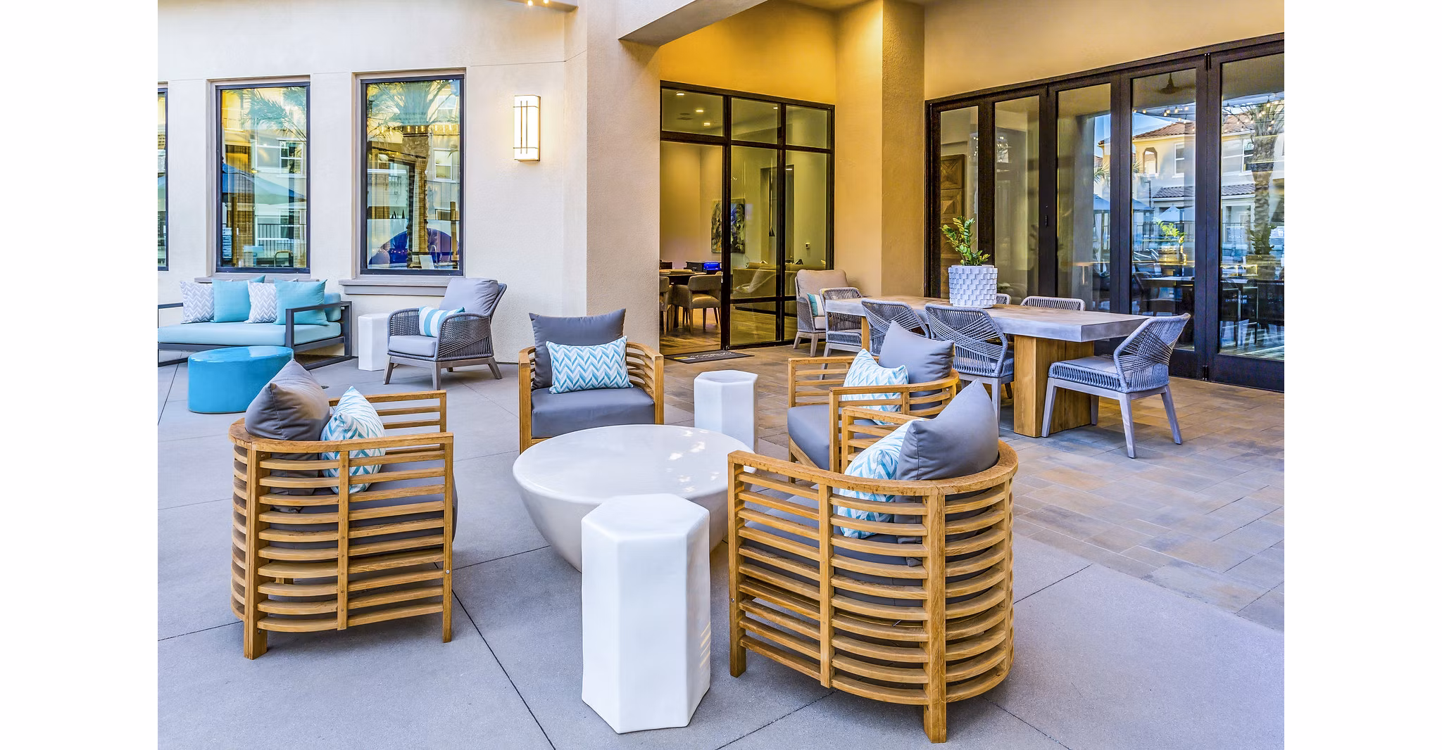Outdoor patio with modern seating at Sorano Apartments, a luxury residential community