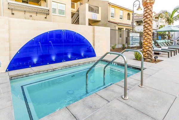 Relaxing hot tub at Sorano Apartments, luxury Greystar property offering modern amenities for ultimate comfort and leisure