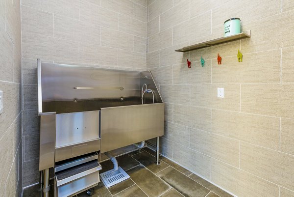 Dog wash station at Sorano Apartments, a convenient amenity for pet owners in luxury living spaces