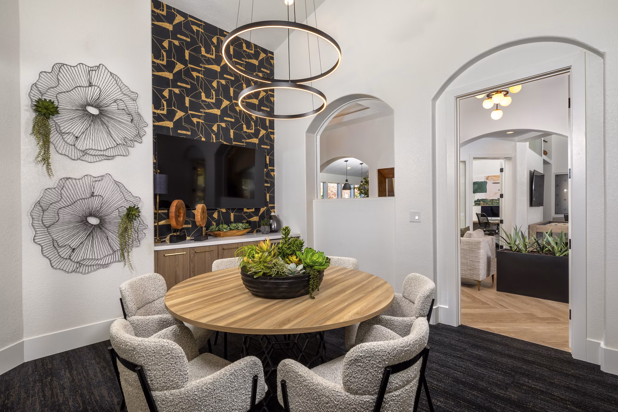 Clubhouse with modern decor and seating at Tuscany Ridge Apartments, a Greystar luxury property