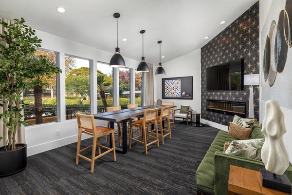 Clubhouse featuring modern design and ample seating at Tuscany Ridge Apartments