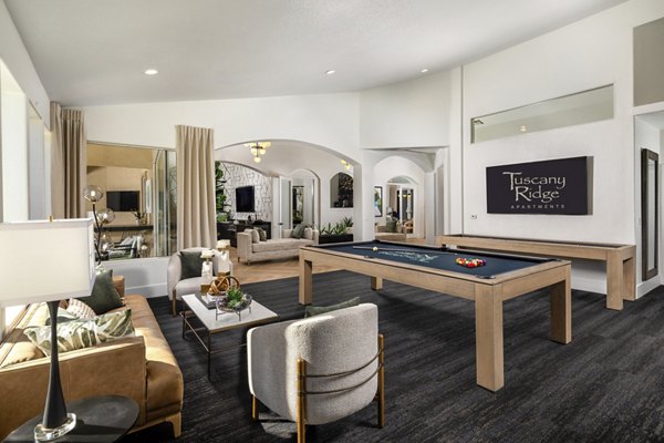 Tuscany Ridge Apartments: Elegant clubhouse with modern decor and seating areas, perfect for socializing and events
