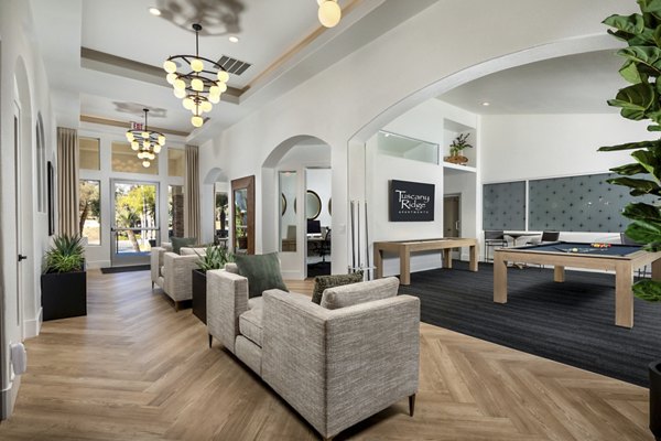 Clubhouse with modern design at Tuscany Ridge Apartments featuring relaxing lounges and community spaces