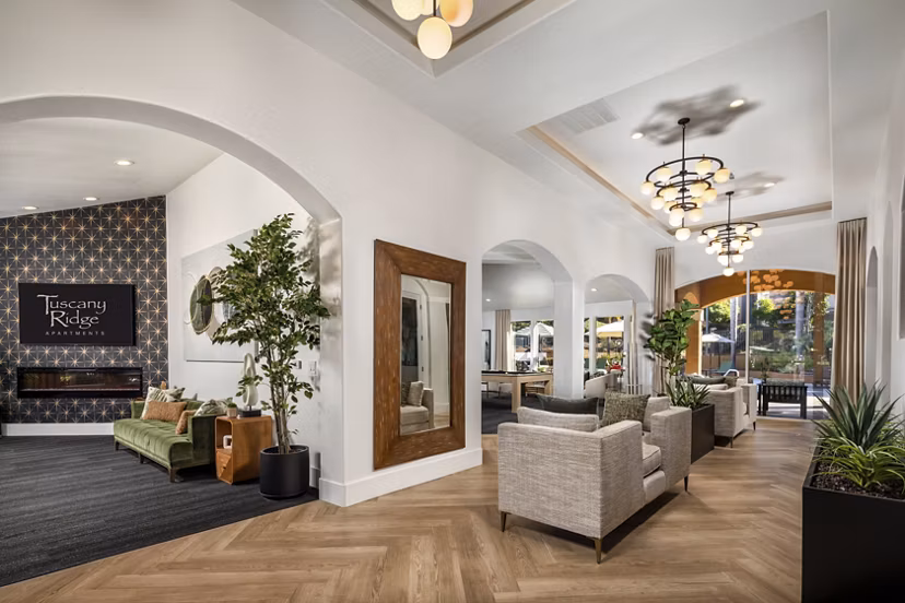 Tuscany Ridge Apartments: Elegant clubhouse featuring modern design and cozy seating areas in a luxury apartment community
