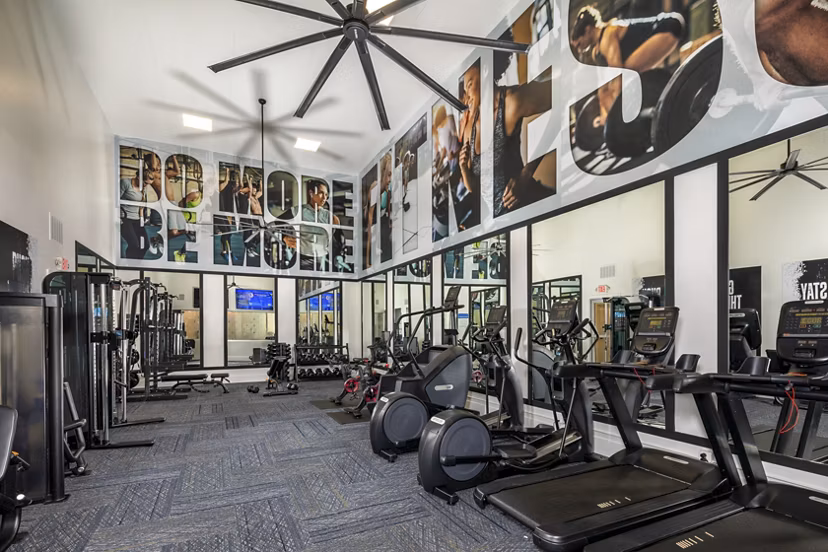 Spacious fitness center with modern equipment at Tuscany Ridge Apartments, offering residents a top-tier workout experience