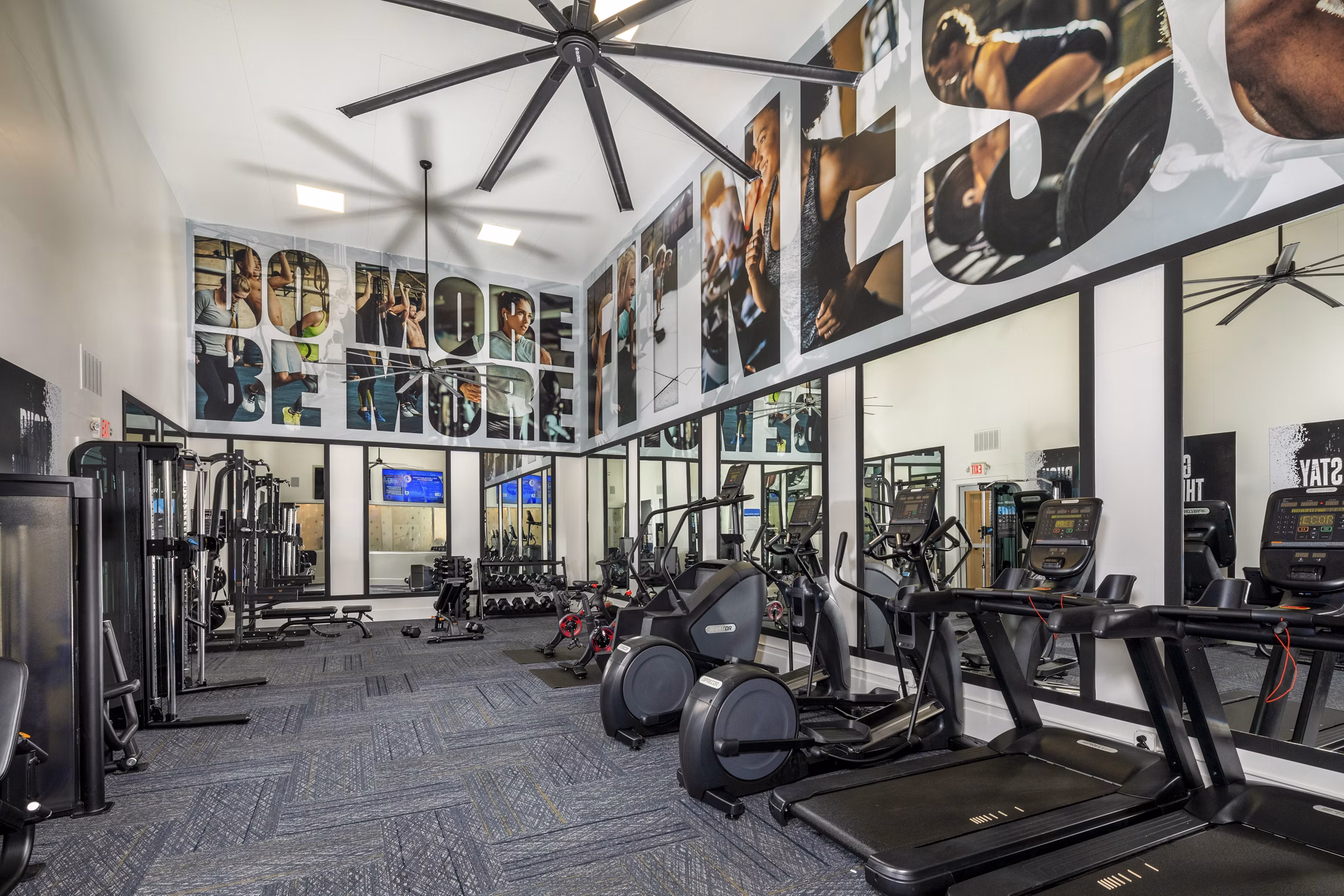 Spacious fitness center with modern equipment at Tuscany Ridge Apartments, offering residents a top-tier workout experience