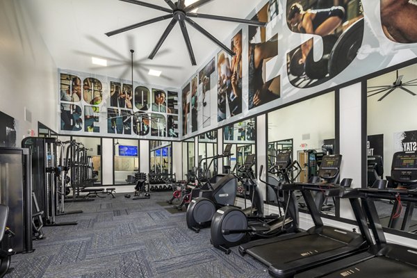 Spacious fitness center with modern equipment at Tuscany Ridge Apartments, offering residents a top-tier workout experience