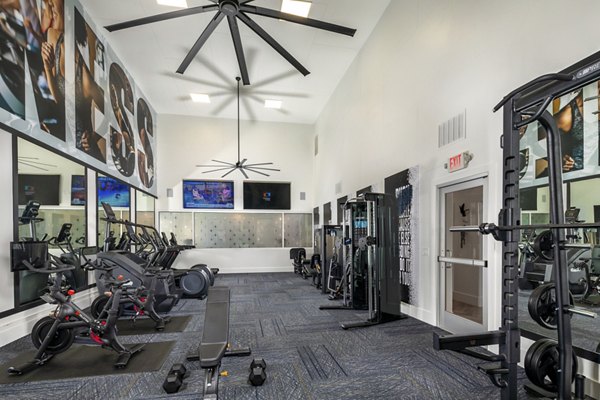 State-of-the-art fitness center with modern equipment at Tuscany Ridge Apartments