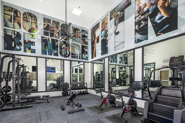 Modern fitness center with state-of-the-art equipment at Tuscany Ridge Apartments
