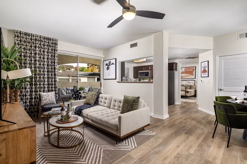 Spacious living room with contemporary decor in Tuscany Ridge Apartments, a luxury property by Greystar
