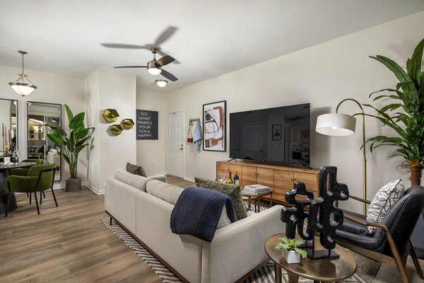Spacious living room with contemporary decor at Tuscany Ridge Apartments, a Greystar luxury apartment community
