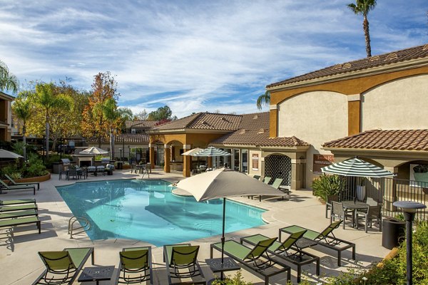 Refreshing pool at Tuscany Ridge Apartments offering relaxation and leisure in a luxurious setting, surrounded by scenic views