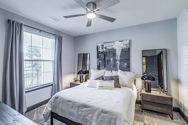 bedroom at The Louis Apartments