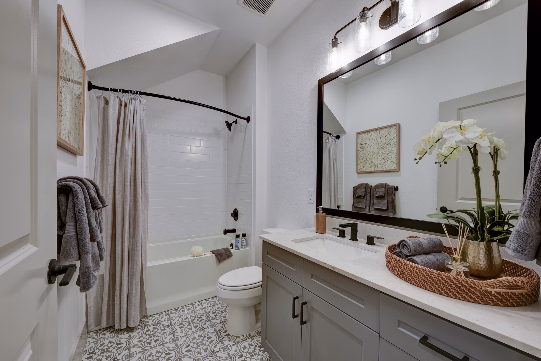 Modern bathroom with sleek fixtures at Arbolada Apartments