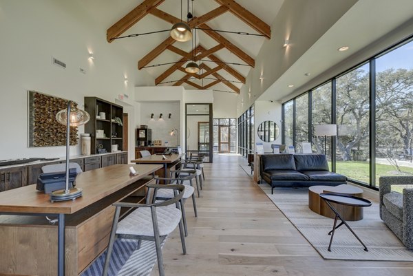 Clubhouse featuring modern communal spaces at Arbolada Apartments Perfect gathering place with luxury amenities in a vibrant community