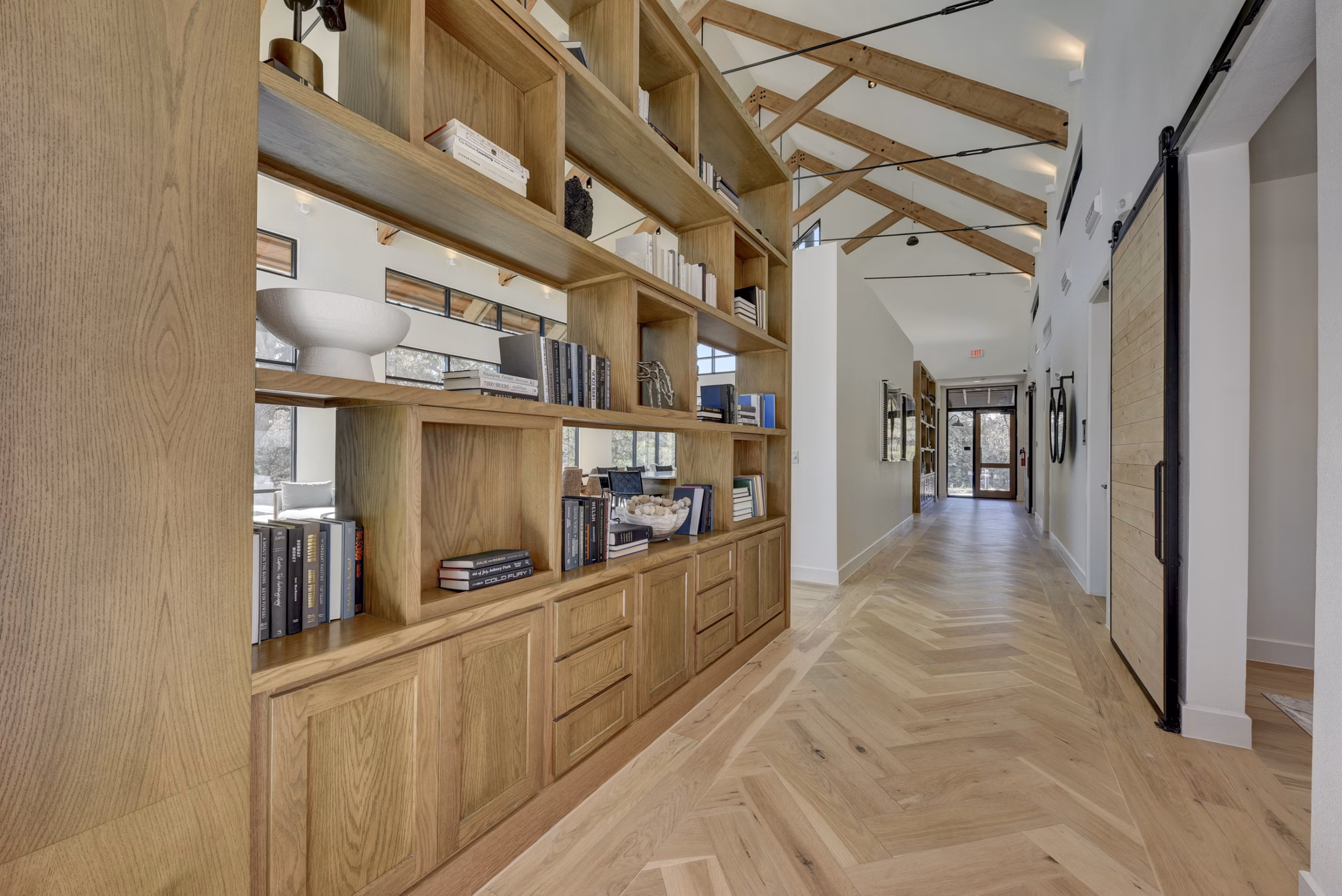 Community gathering space in clubhouse at Arbolada Apartments featuring modern decor and cozy seating areas, perfect for resident events and relaxation