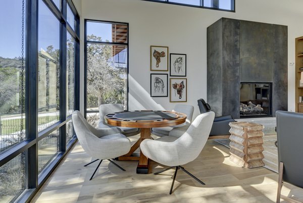 Clubhouse featuring modern design and comfortable seating at Arbolada Apartments, a luxury Greystar community in a serene setting