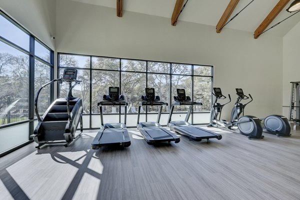 Fitness center with state-of-the-art equipment at Arbolada Apartments, promoting health and wellness in a convenient location