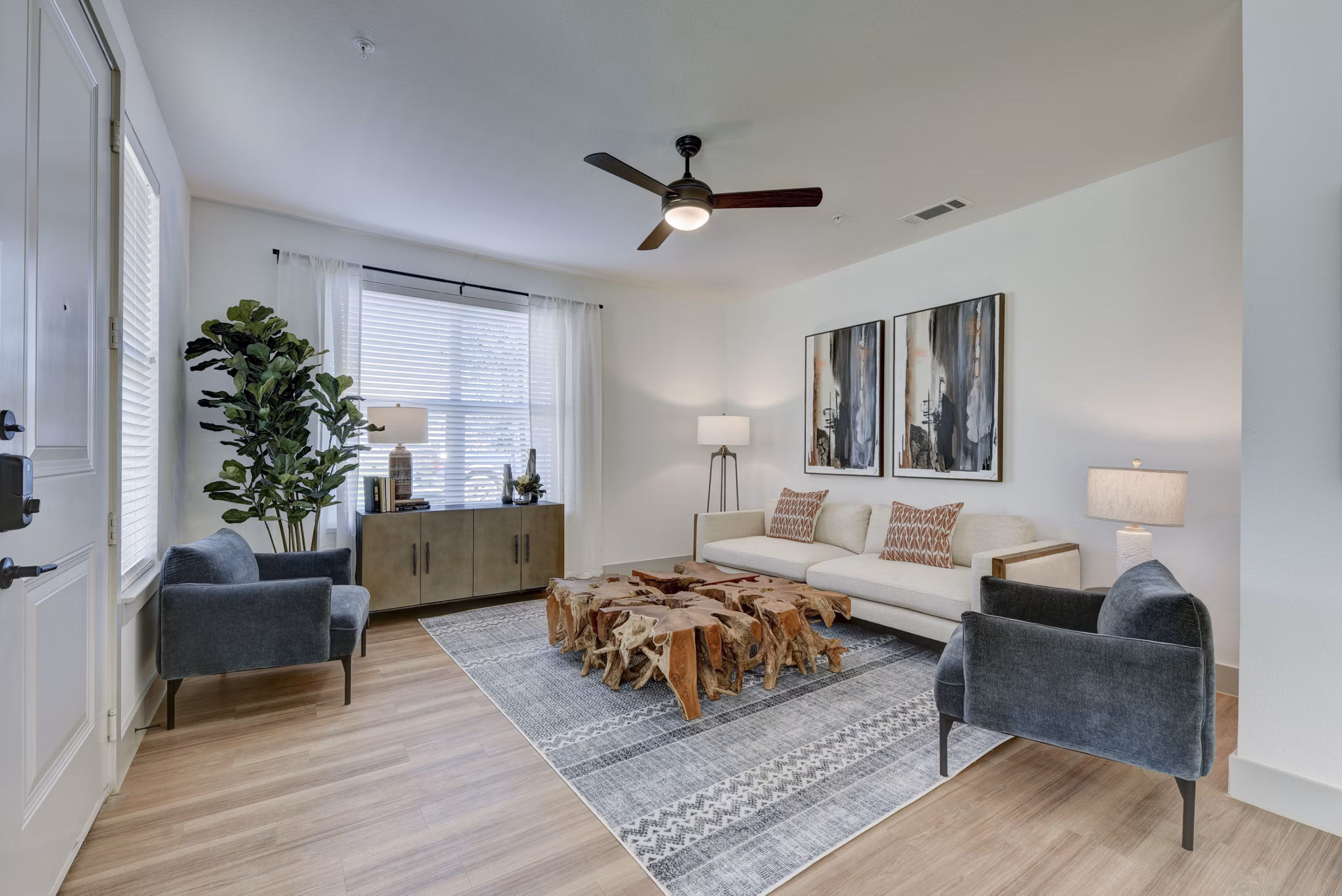 Spacious living room with modern furnishings at Arbolada Apartments, Greystar luxury apartments