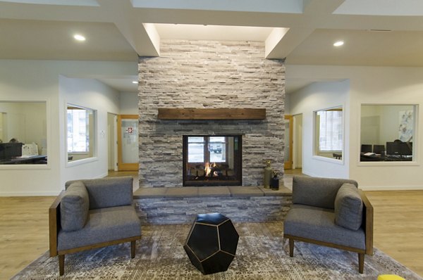 Luxurious clubhouse with modern amenities at Britton Place Apartments, ideal for gatherings and relaxation in a premium community setting
