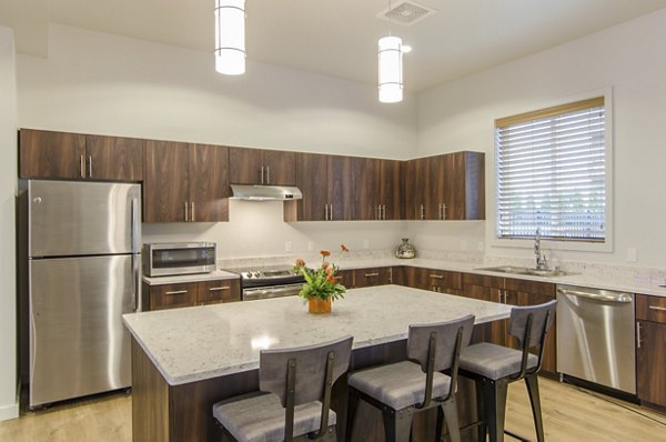 Clubhouse at Britton Place Apartments featuring modern furnishings and social spaces for residents