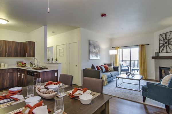 Dining area with elegant lighting and modern furniture in Britton Place Apartments