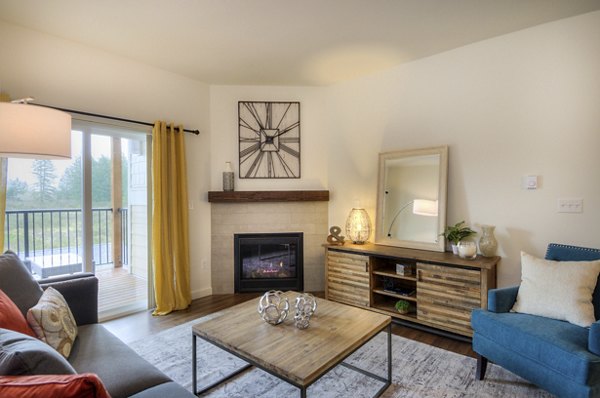 Living room featuring modern furnishings at Britton Place Apartments in Lacey, WA