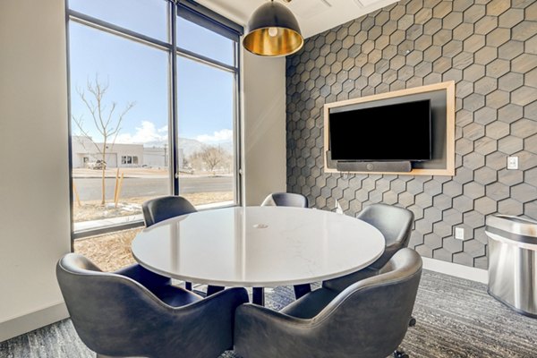 Reimagined meeting space with modern amenities at The Plaza at Pikes Peak Apartments