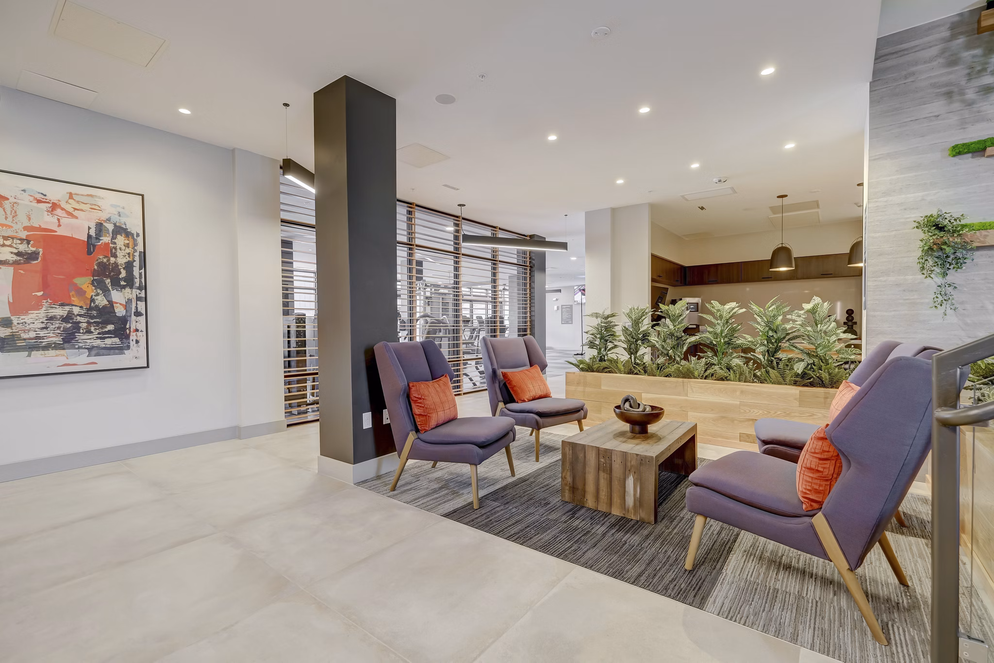 Clubhouse featuring modern interiors at The Plaza at Pikes Peak Apartments