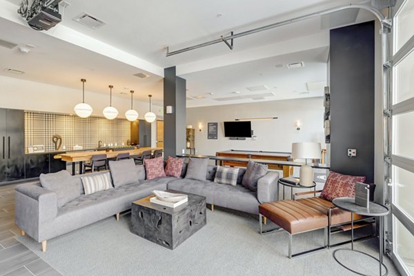 Clubhouse with modern design and elegant seating at The Plaza at Pikes Peak Apartments