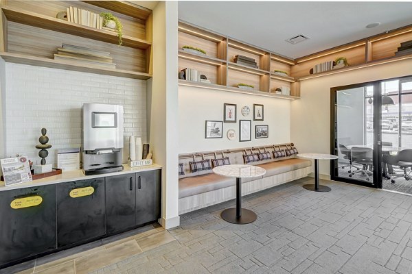 Luxurious clubhouse with contemporary design at The Plaza at Pikes Peak Apartments, offering premium amenities for residents in Colorado Springs