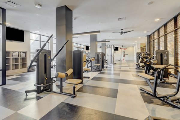 fitness center at The Plaza at Pikes Peak Apartments