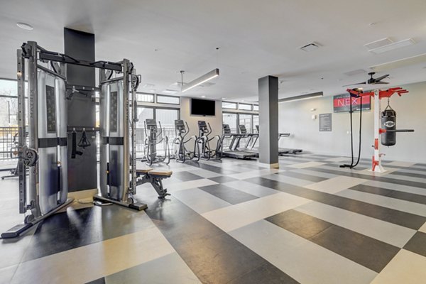 State-of-the-art fitness center with modern equipment at The Plaza at Pikes Peak Apartments