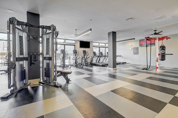 fitness center at The Plaza at Pikes Peak Apartments