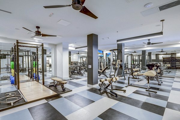 fitness center at The Plaza at Pikes Peak Apartments