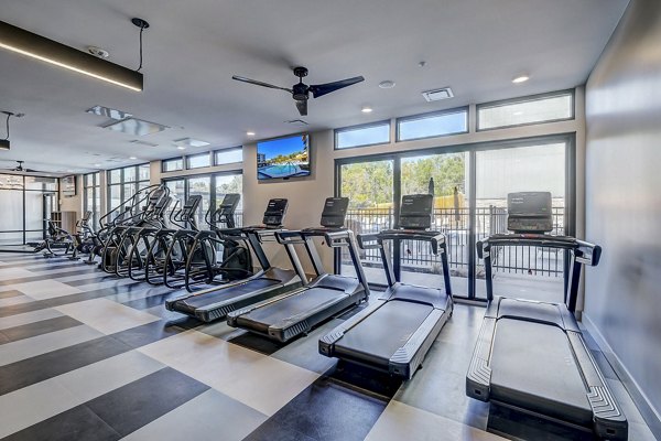 fitness center at The Plaza at Pikes Peak Apartments