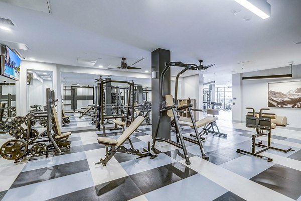 State-of-the-art fitness center featuring modern equipment at The Plaza at Pikes Peak Apartments