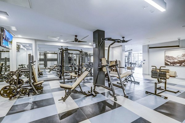 fitness center at The Plaza at Pikes Peak Apartments