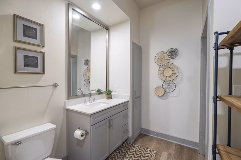 Modern bathroom with sleek fixtures at Seville Uptown Apartments