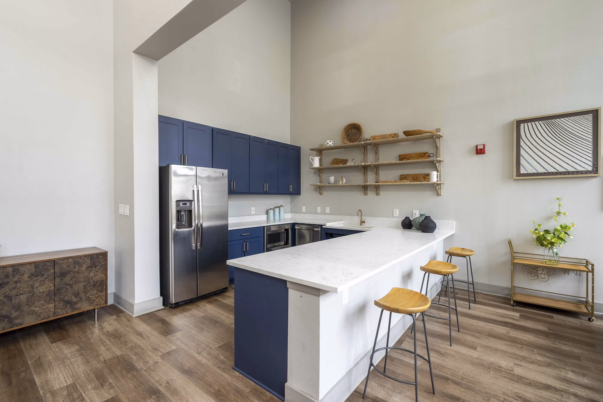 Clubhouse with modern design and comfortable seating at Seville Uptown Apartments