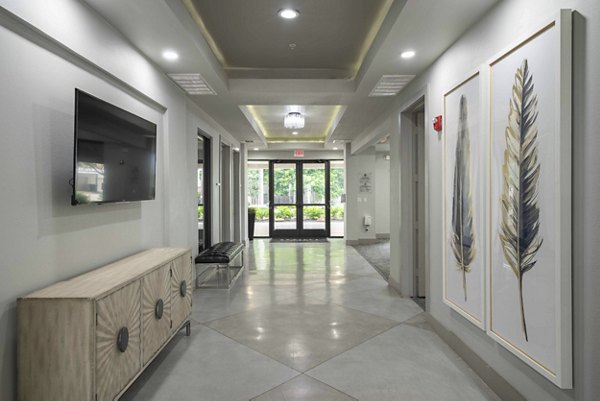 Clubhouse with contemporary design elements at Seville Uptown Apartments offering luxury spaces for social gatherings and relaxation