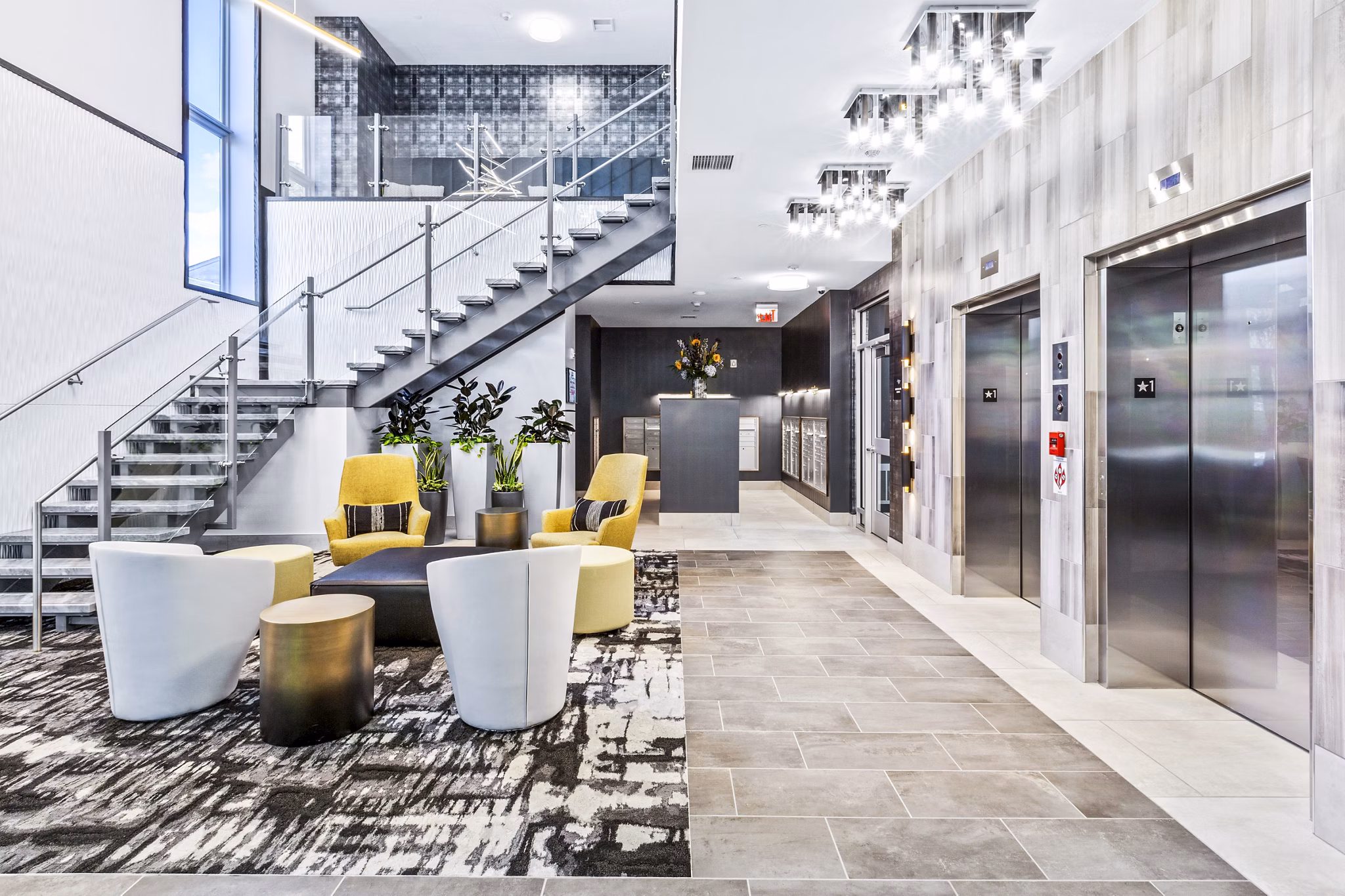 Clubhouse featuring a modern lobby design at The Park at Woodbridge Station Apartments, showcasing luxury living spaces and elegant decor