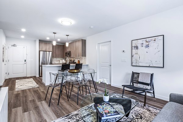 Dining room with elegant furnishings at The Park at Woodbridge Station Apartments