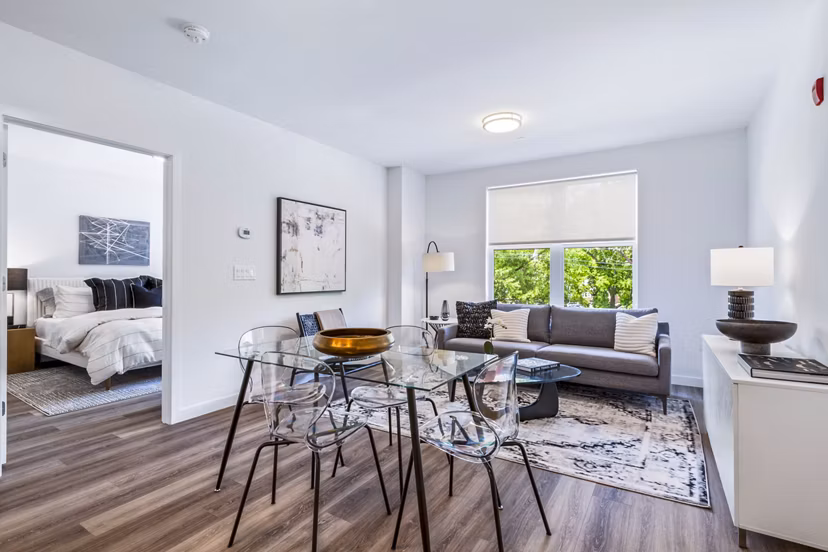 Dining room featuring modern decor at The Park at Woodbridge Station Apartments Ideal for luxury living in a Greystar community