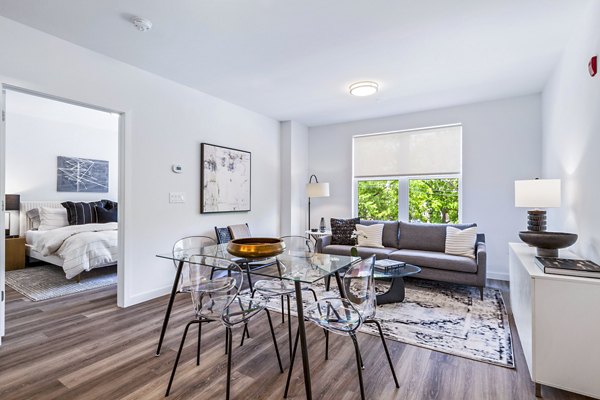 Dining room featuring modern decor at The Park at Woodbridge Station Apartments Ideal for luxury living in a Greystar community