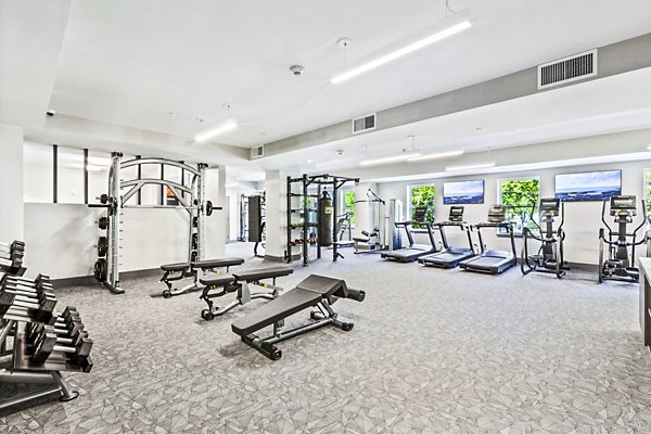 fitness center at The Park at Woodbridge Station Apartments