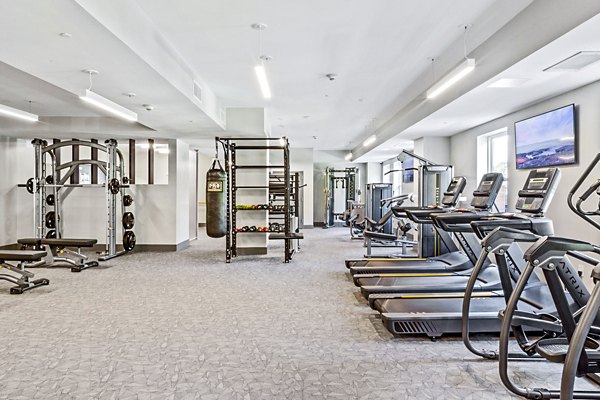 fitness center at The Park at Woodbridge Station Apartments