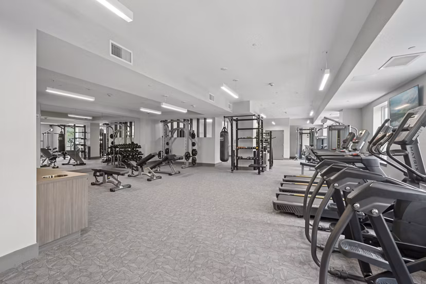 fitness center at The Park at Woodbridge Station Apartments