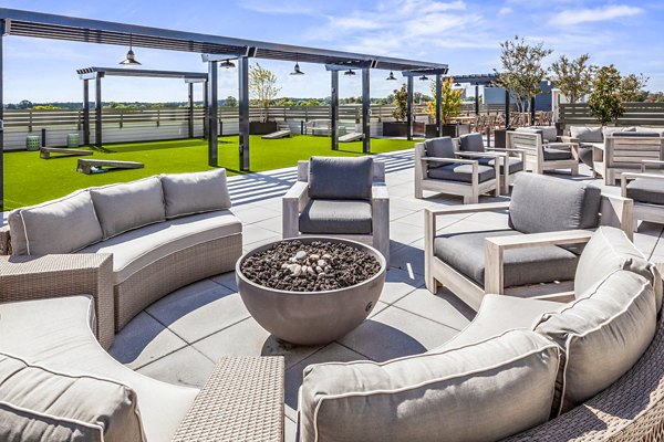 fire pit/patio at The Park at Woodbridge Station Apartments